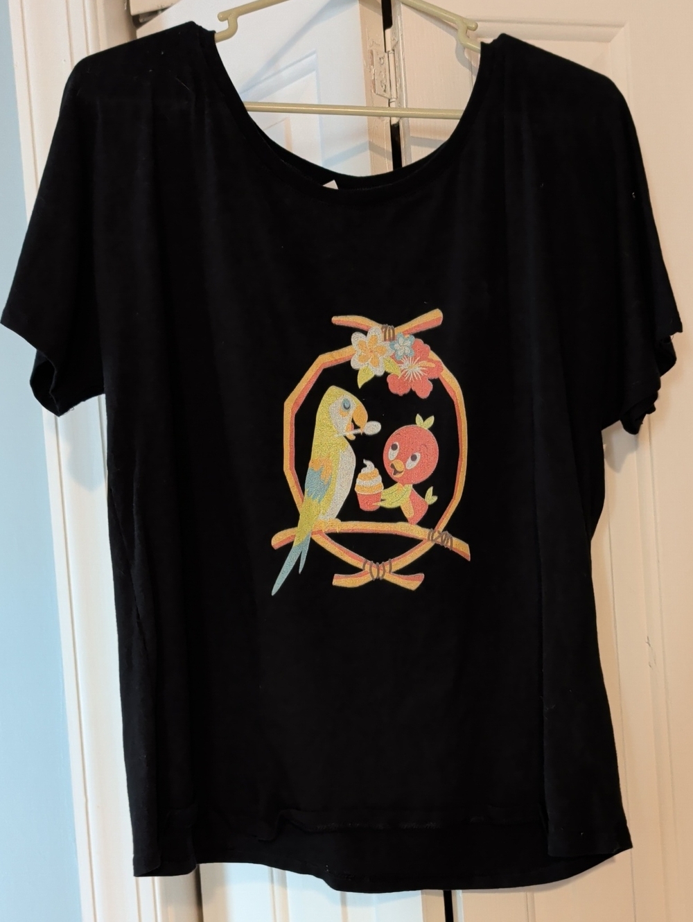Disney Orange Bird And Tiki Parrot Tee Shirt With Round Neckline. Size Medium